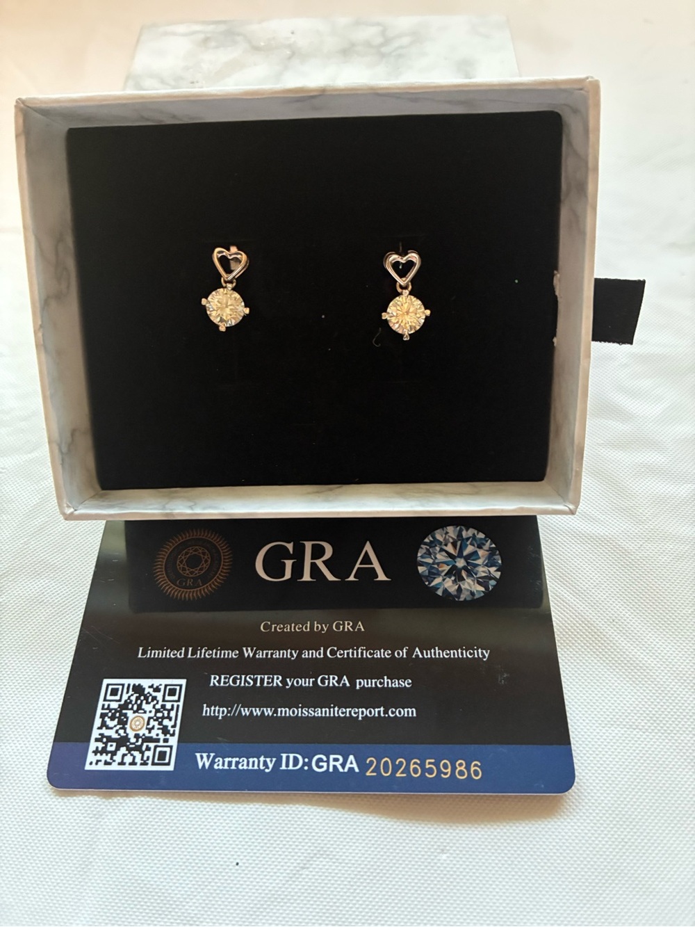 Gold Heart Drop Earrings with Clear Stones
